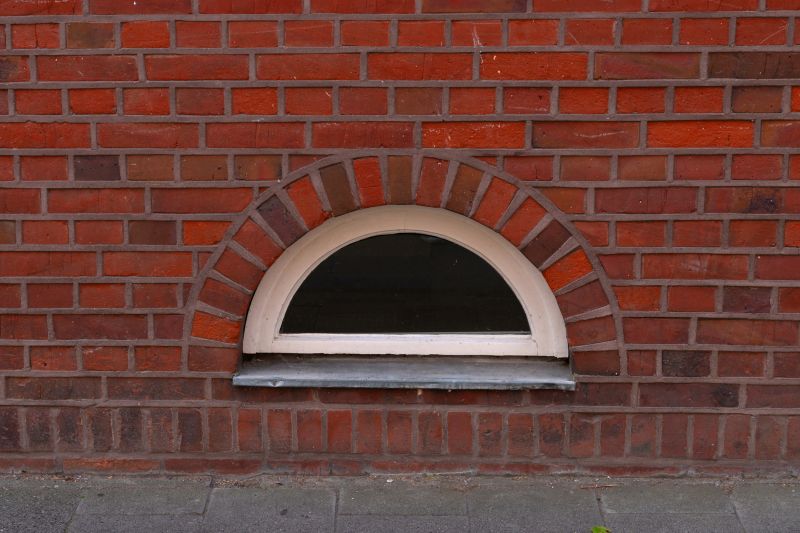 Arched window installation